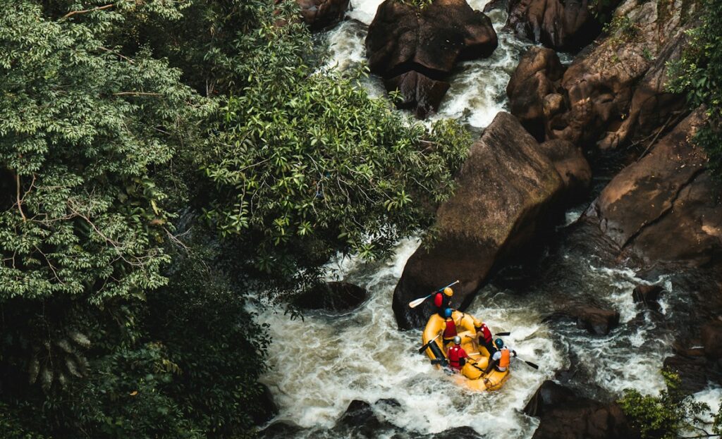 people rafting in the river